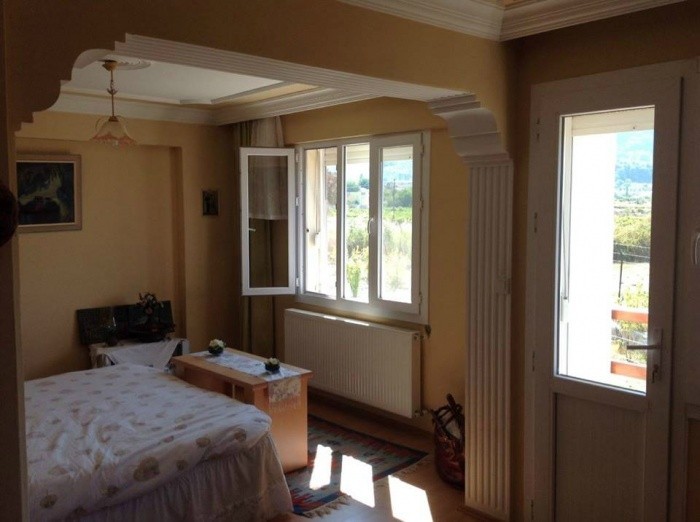 ДОМ С ЧАСТНЫМ САДОВЫМ УЧАСТКОМ ПЛОЩАДЬЮ 2340 М2 В КУШАДАСЫ.