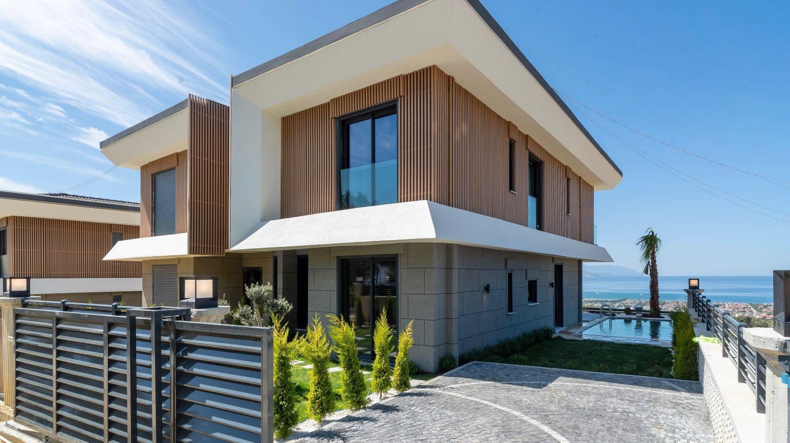 РОСКОШНЫЕ ВИЛЛЫ С ВИДОМ НА МОРЕ НА ПРОДАЖУ В КУШАДАСЫ.