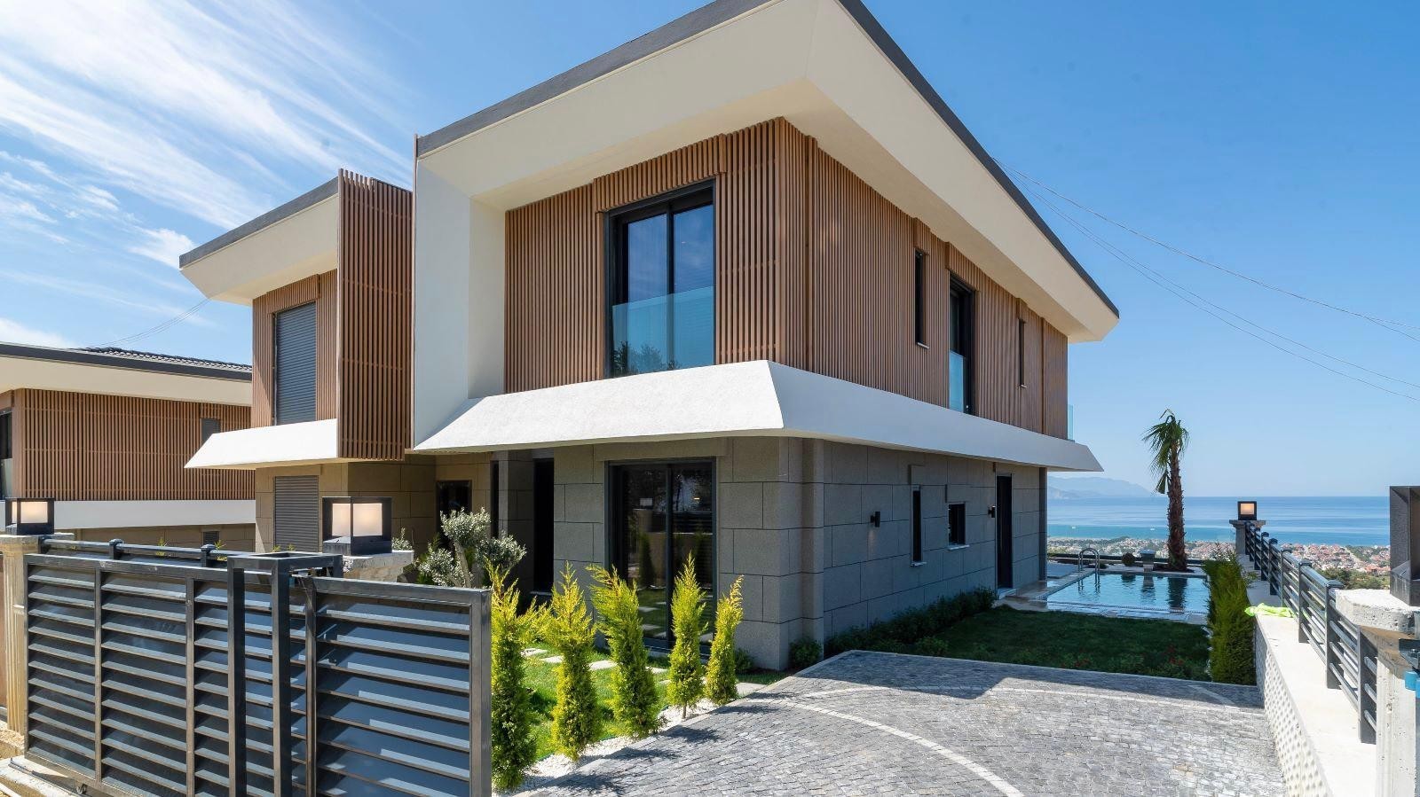 РОСКОШНЫЕ ВИЛЛЫ С ВИДОМ НА МОРЕ НА ПРОДАЖУ В КУШАДАСЫ.