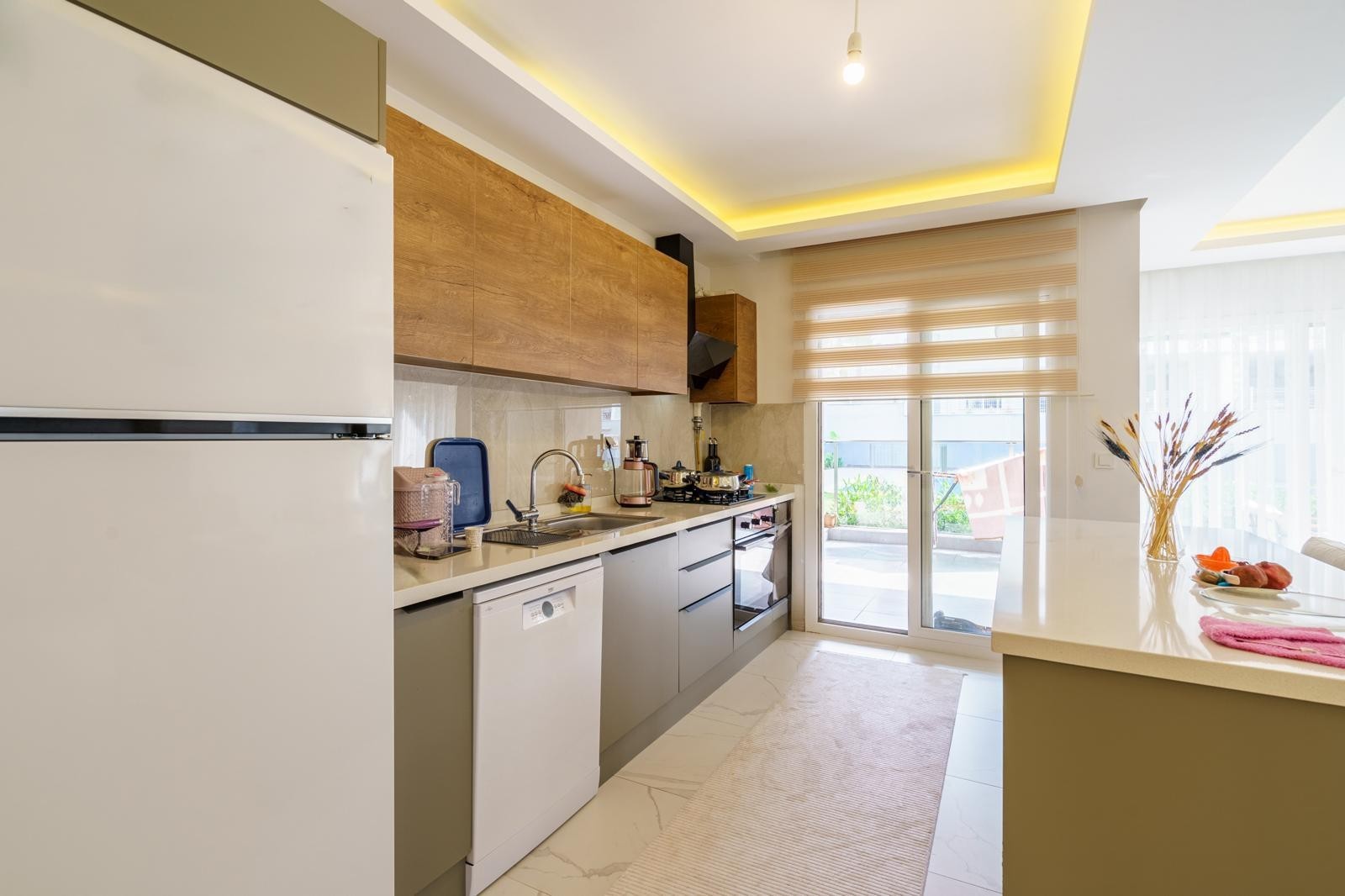 SPECIALLY DESIGNED SPACIOUS 2+1 GARDEN FLOOR