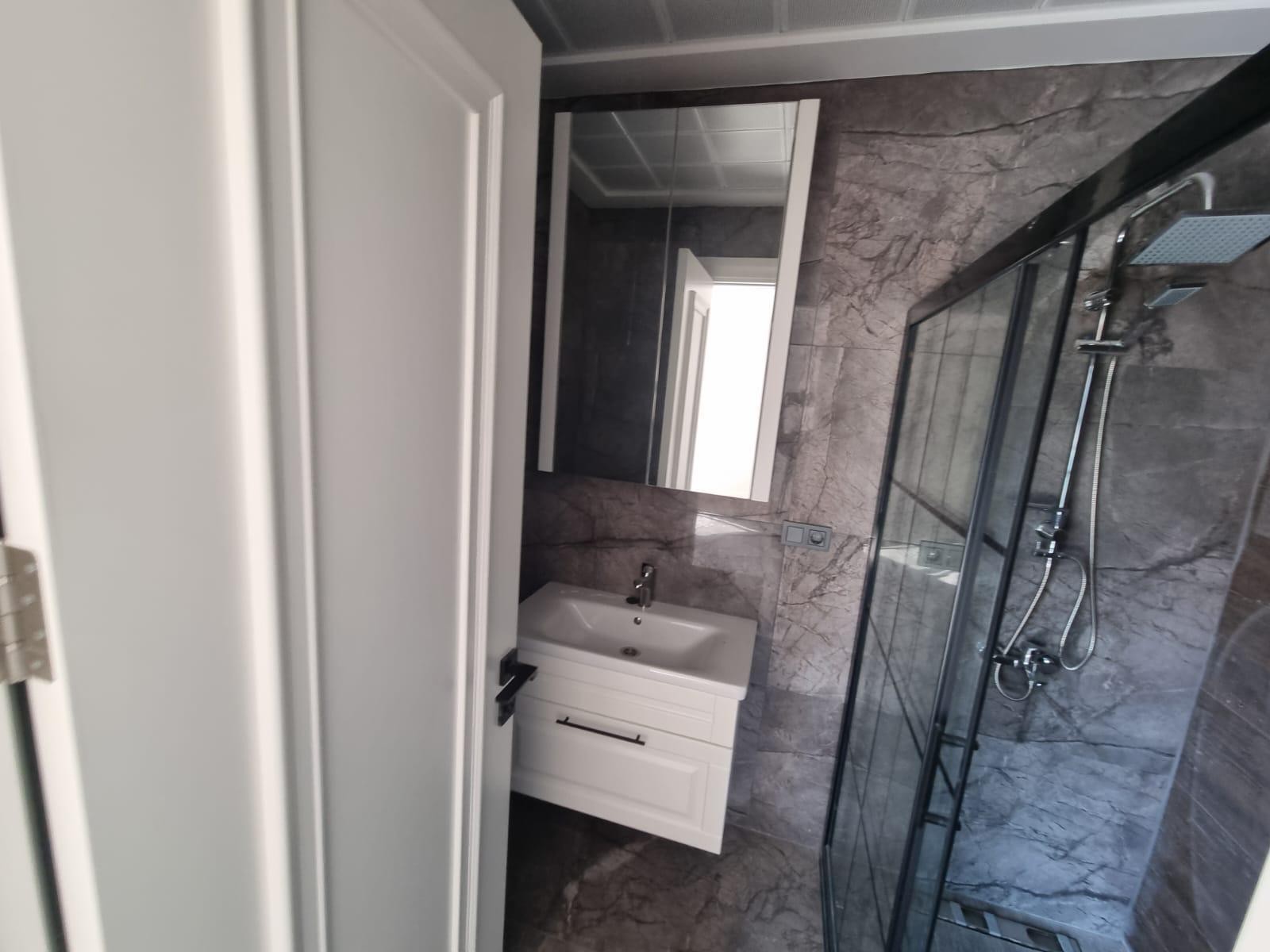 Prime Location in Kuşadası! Modern 2+1 Apartment with Pool and Security