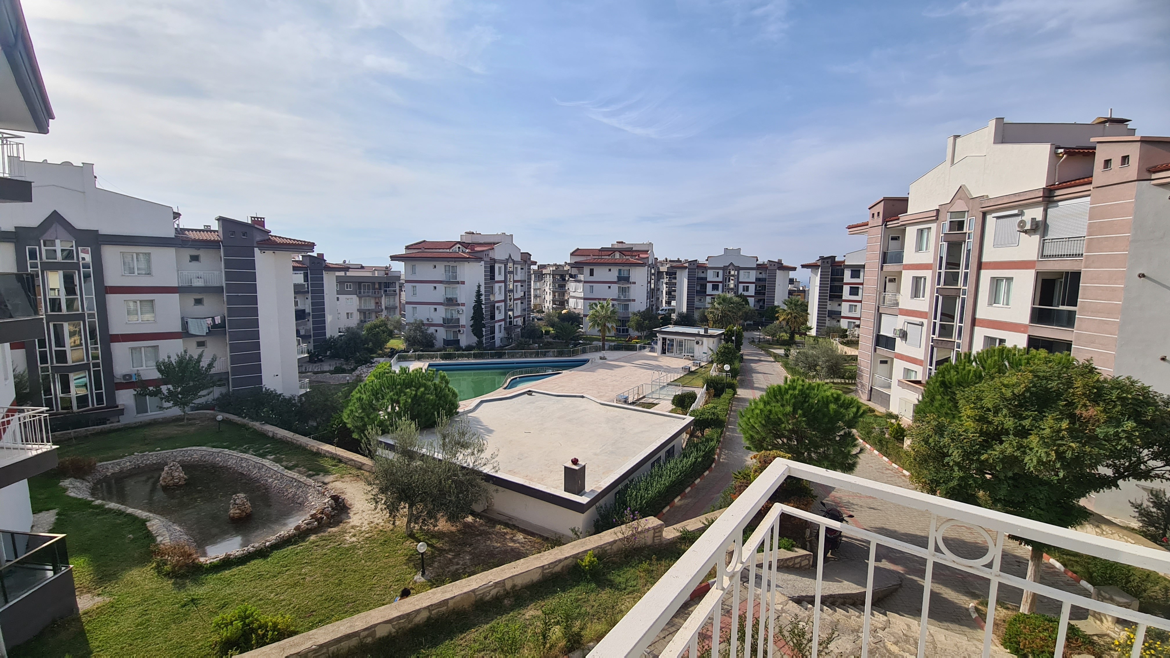 Comfortable 3+1 Apartment for Sale in a Secure Poolside Site in Kuşadası