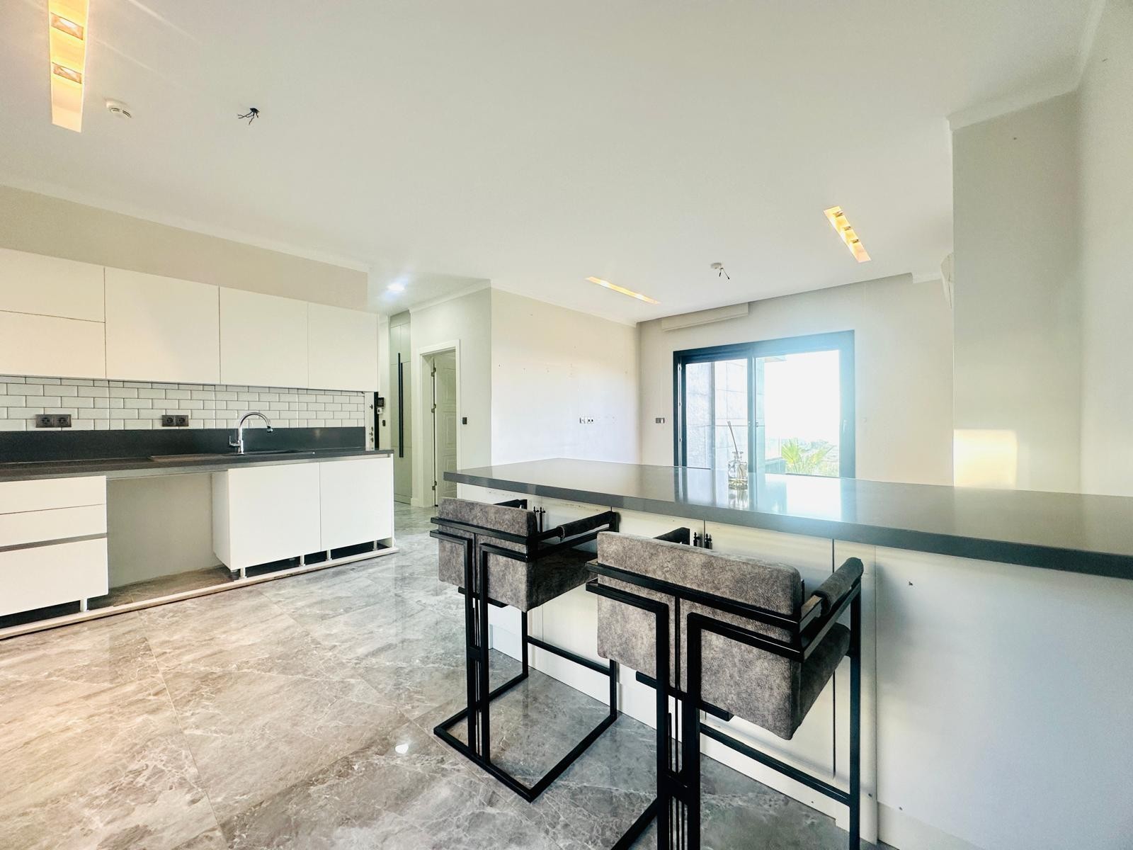 For sale: a two-room residence apartment with a full sea view in Kuşadası.