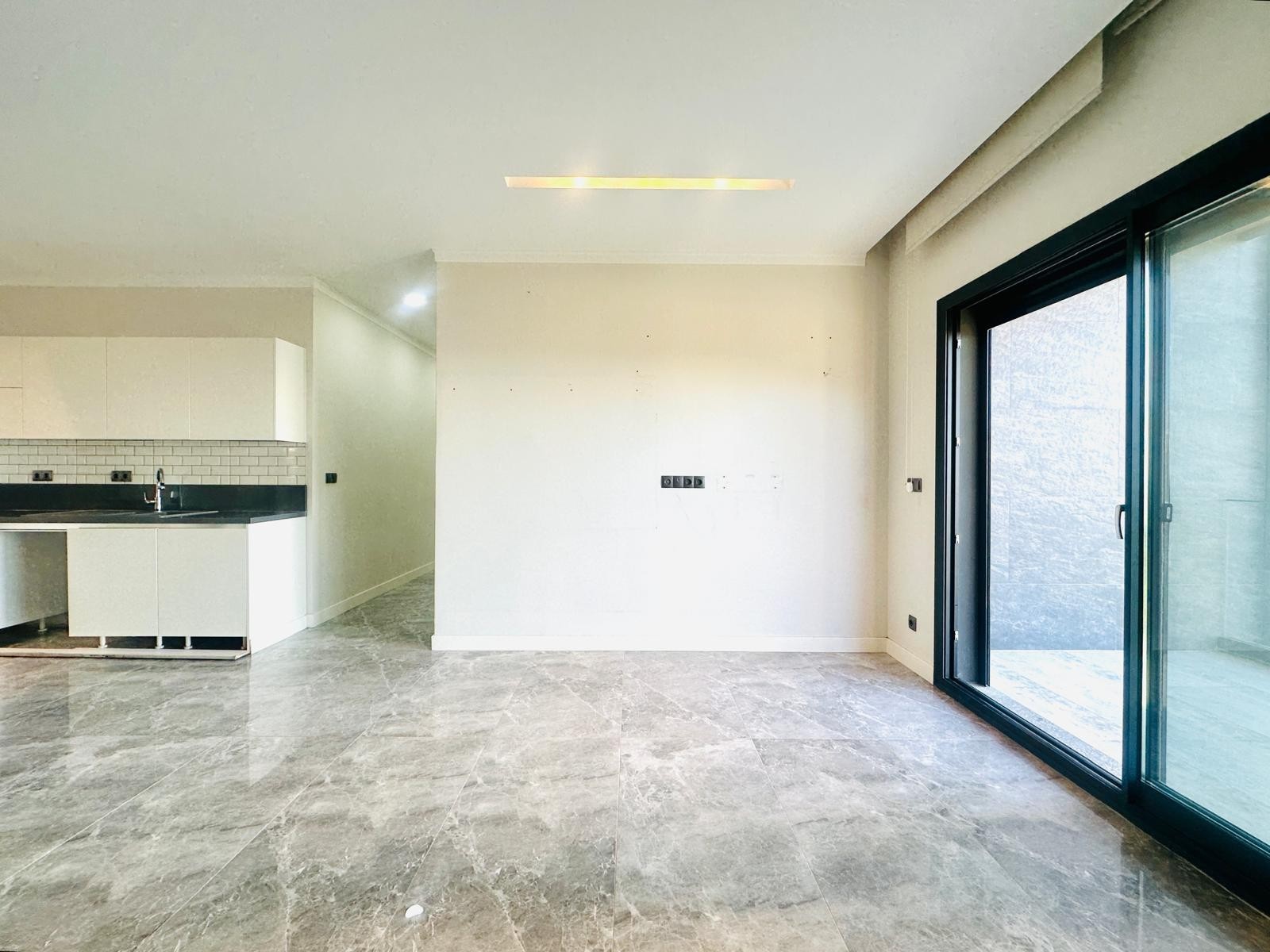 For sale: a two-room residence apartment with a full sea view in Kuşadası.