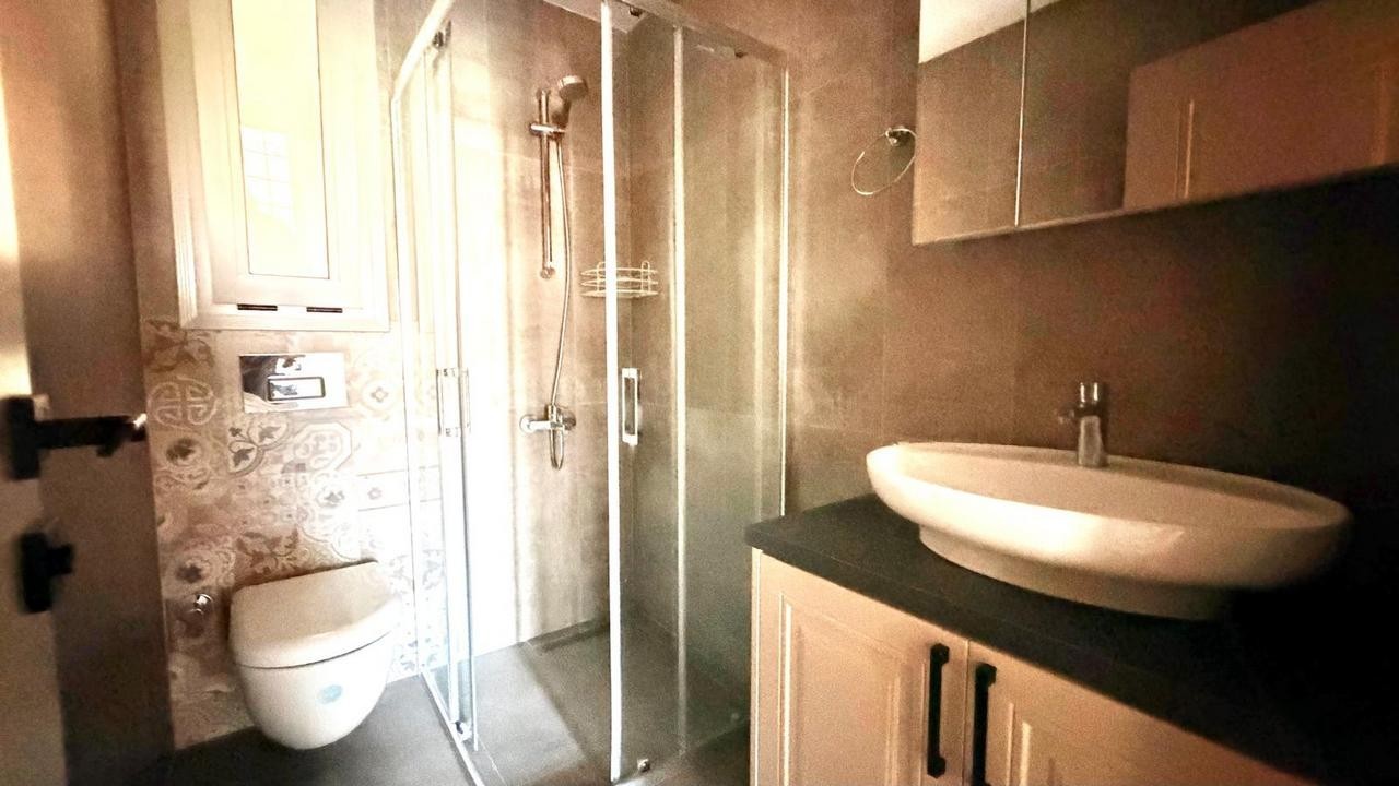 3+1 APARTMENT FOR SALE WITH MOUNTAIN AND POOL VIEWS IN DEĞİRMENDERE, KUŞADASI