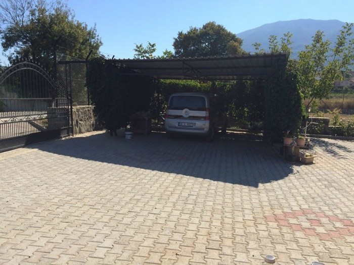 ДОМ С ЧАСТНЫМ САДОВЫМ УЧАСТКОМ ПЛОЩАДЬЮ 2340 М2 В КУШАДАСЫ.