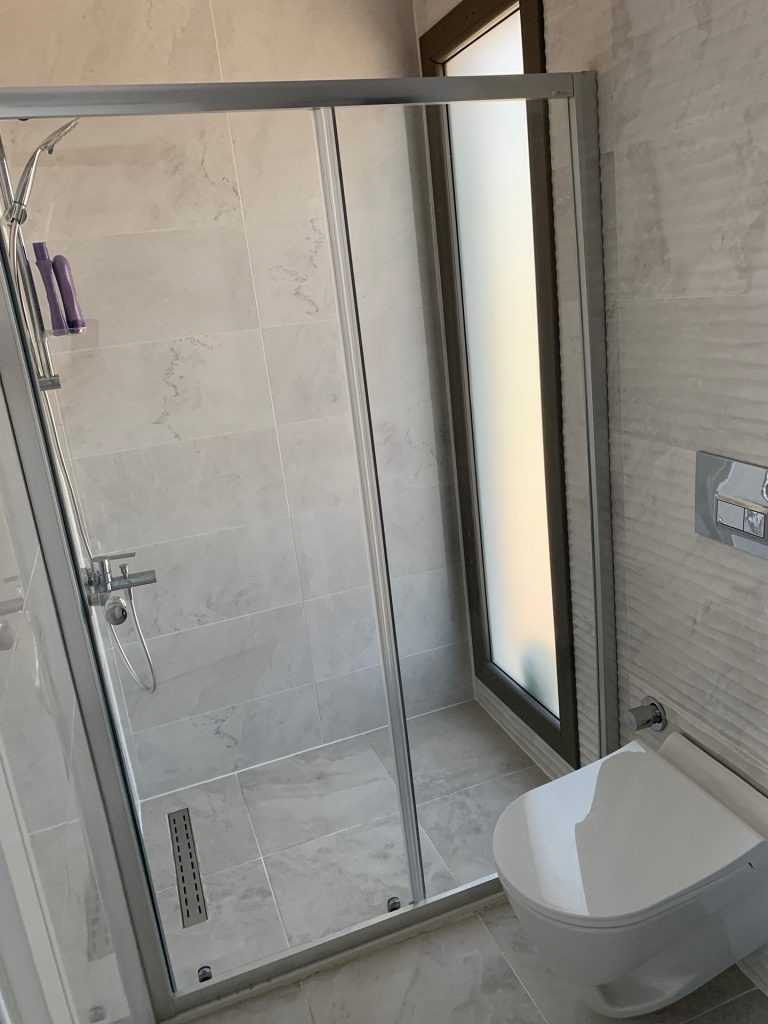 Close to the sea, with private parking, and near the city center, a magnificent villa is for sale.