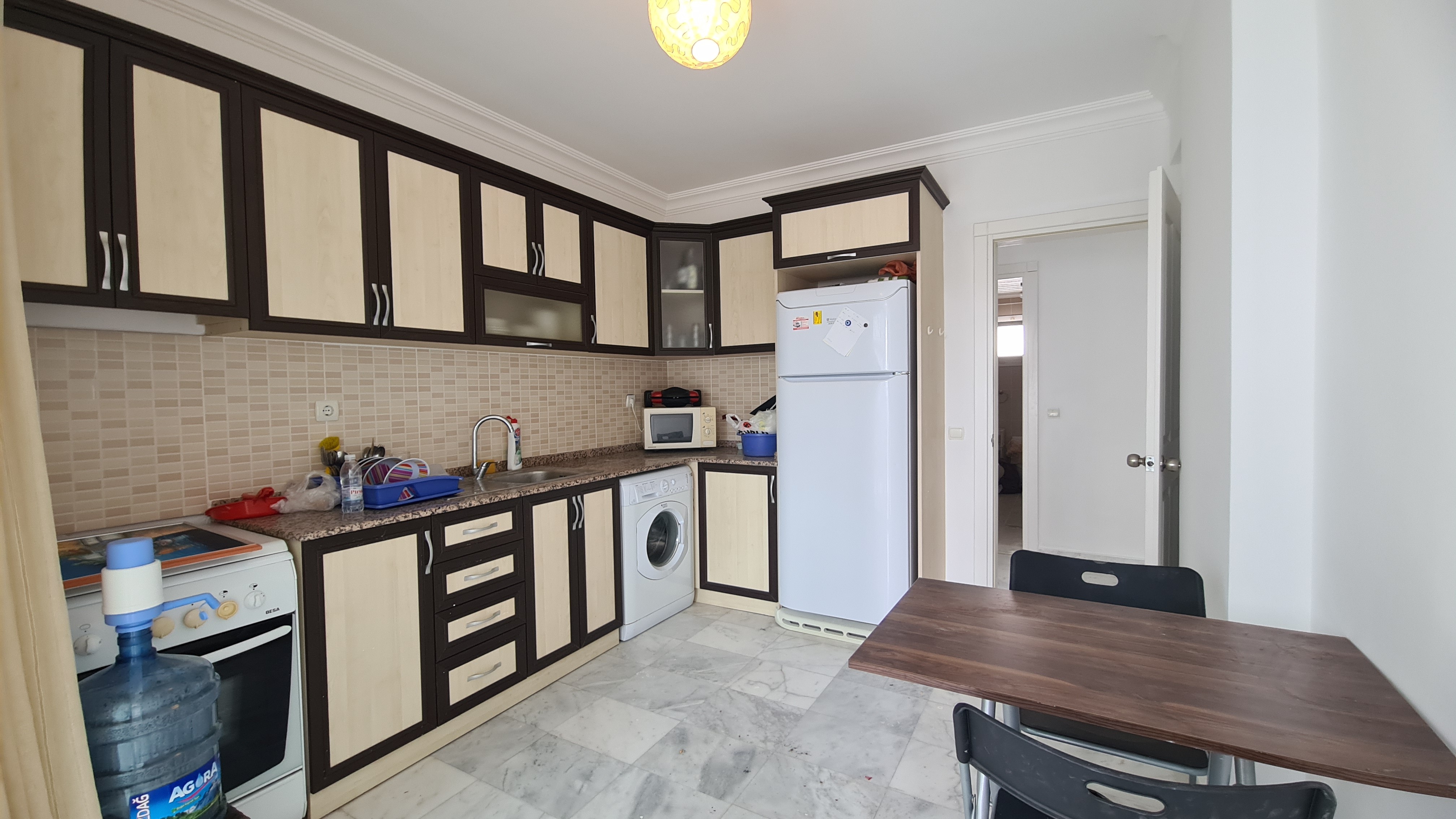 Comfortable 3+1 Apartment for Sale in a Secure Poolside Site in Kuşadası