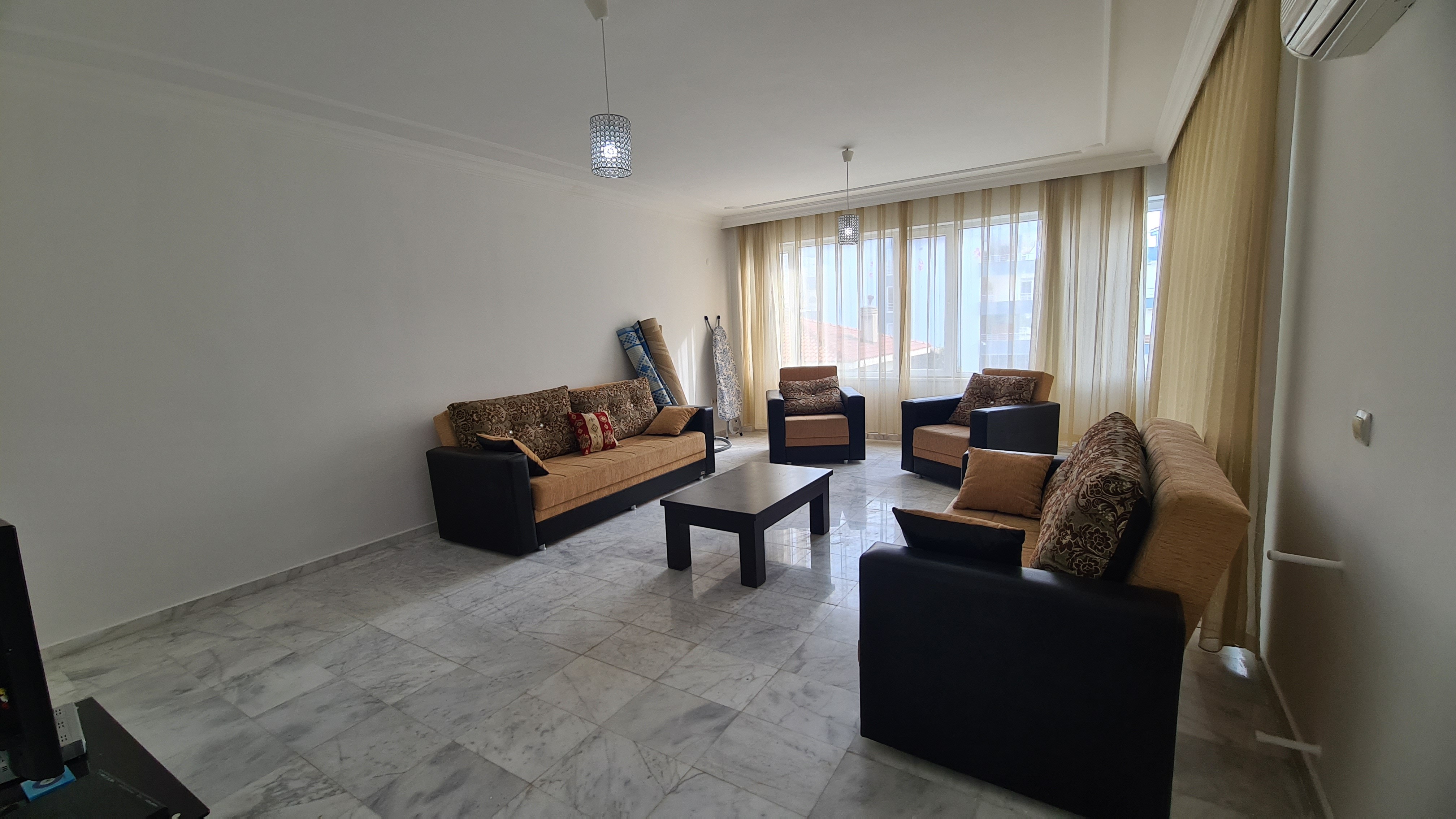 Comfortable 3+1 Apartment for Sale in a Secure Poolside Site in Kuşadası