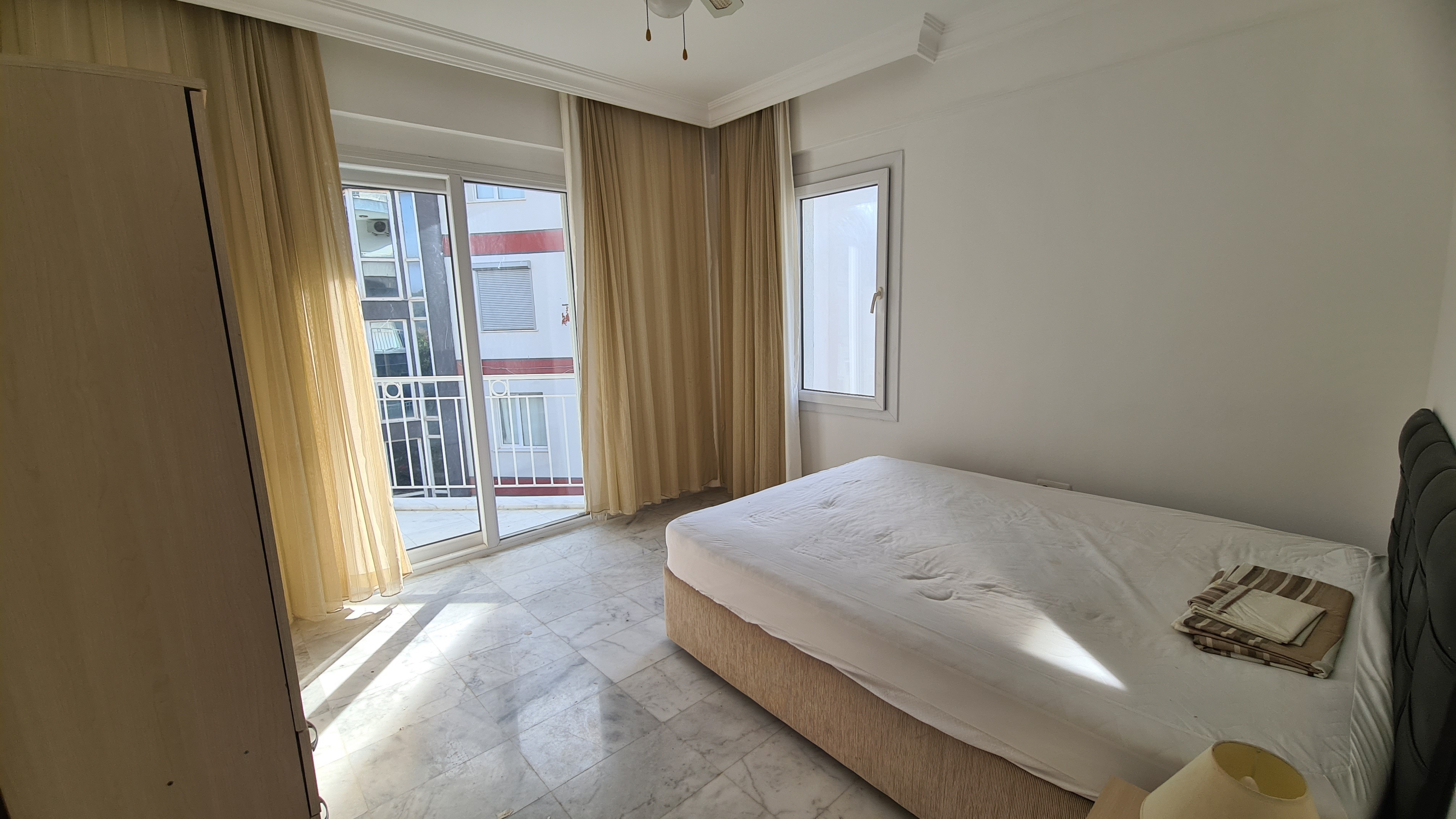 Comfortable 3+1 Apartment for Sale in a Secure Poolside Site in Kuşadası