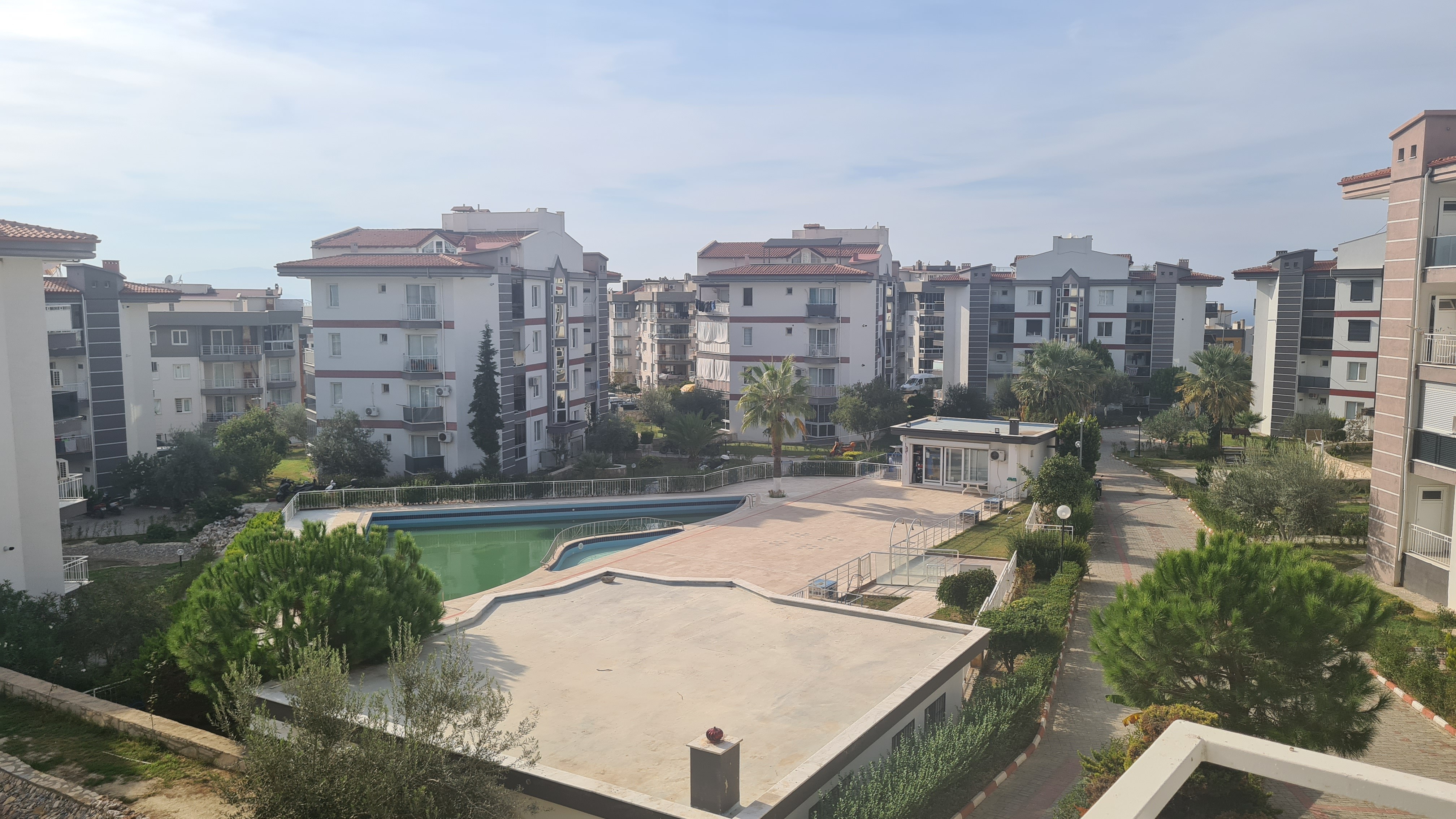 Comfortable 3+1 Apartment for Sale in a Secure Poolside Site in Kuşadası
