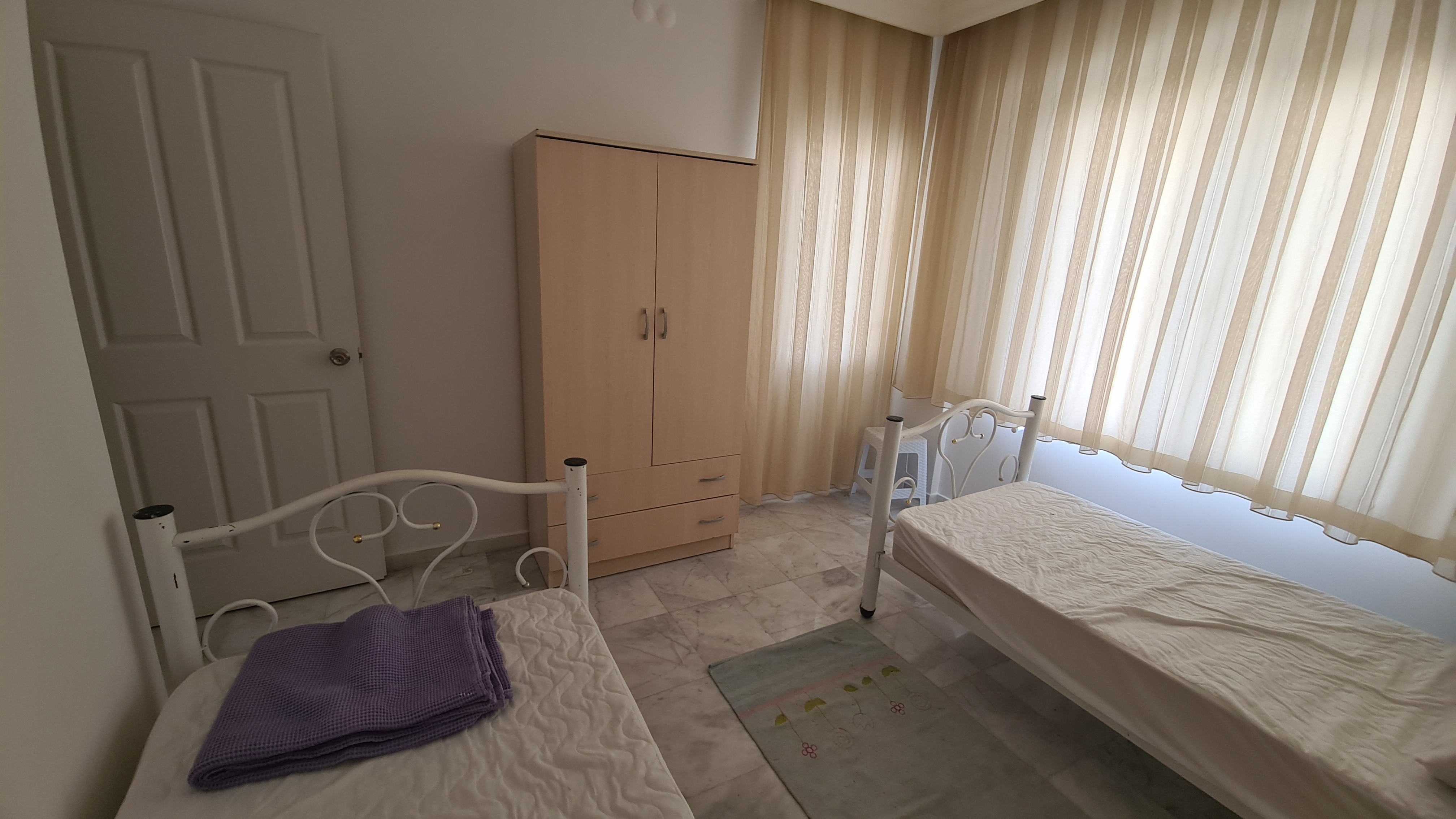 Comfortable 3+1 Apartment for Sale in a Secure Poolside Site in Kuşadası