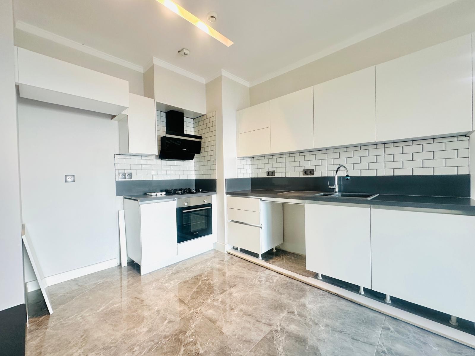 For sale: a two-room residence apartment with a full sea view in Kuşadası.