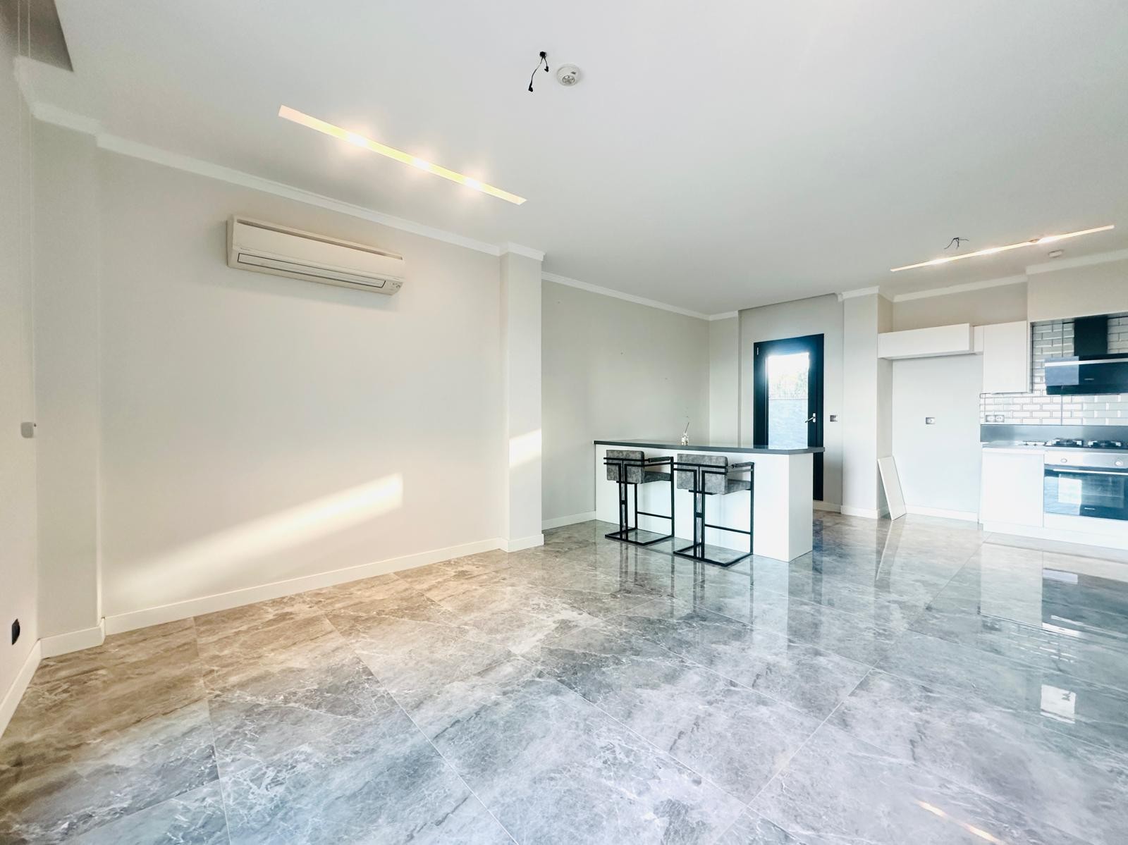 For sale: a two-room residence apartment with a full sea view in Kuşadası.