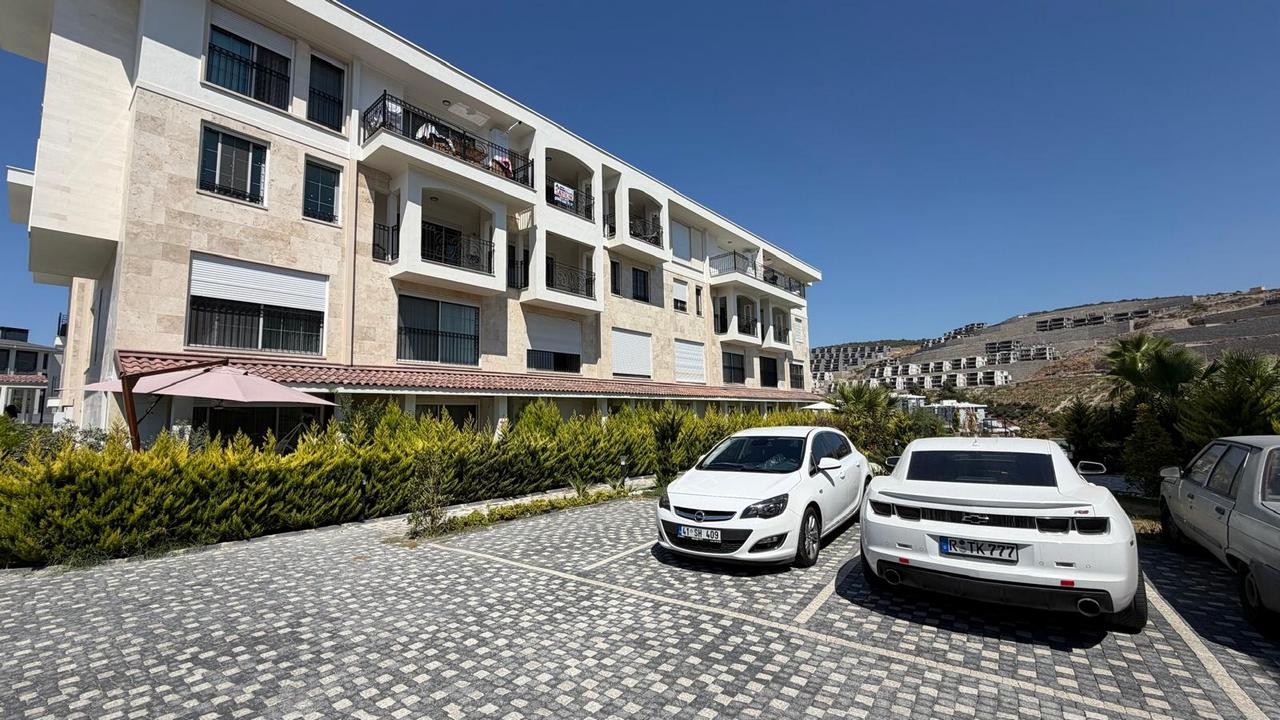 3+1 APARTMENT FOR SALE WITH MOUNTAIN AND POOL VIEWS IN DEĞİRMENDERE, KUŞADASI