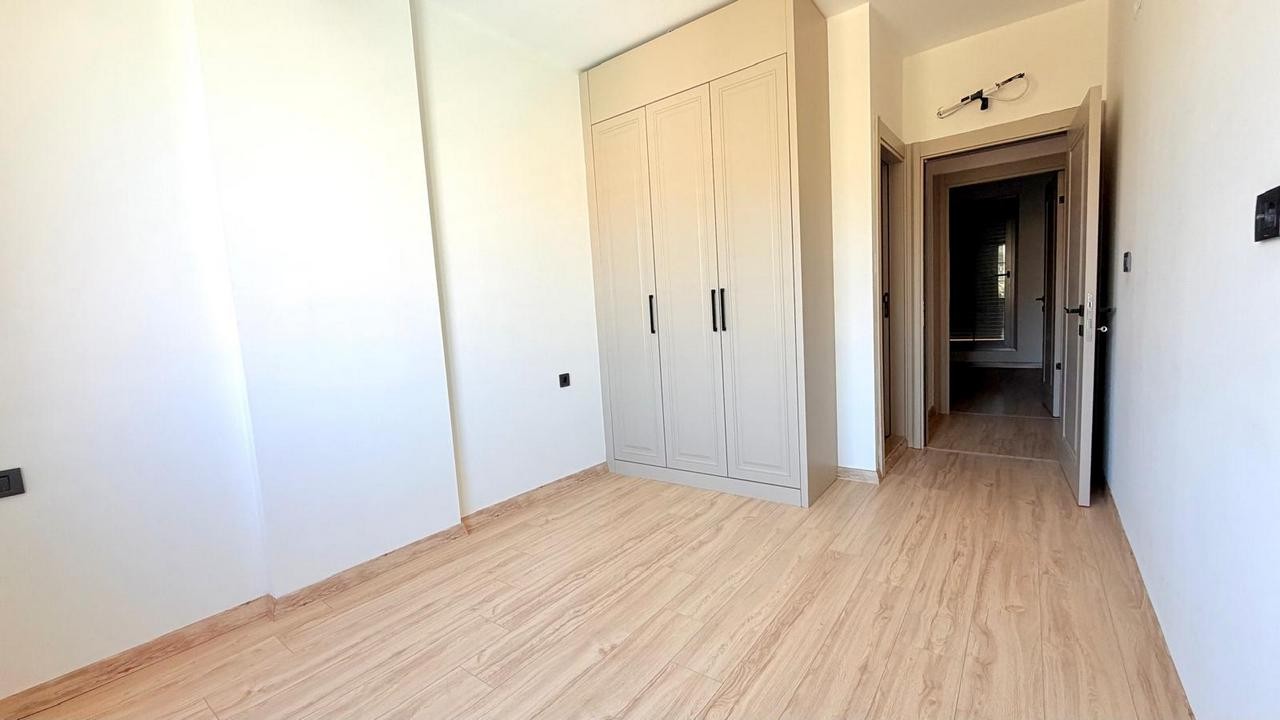 3+1 APARTMENT FOR SALE WITH MOUNTAIN AND POOL VIEWS IN DEĞİRMENDERE, KUŞADASI