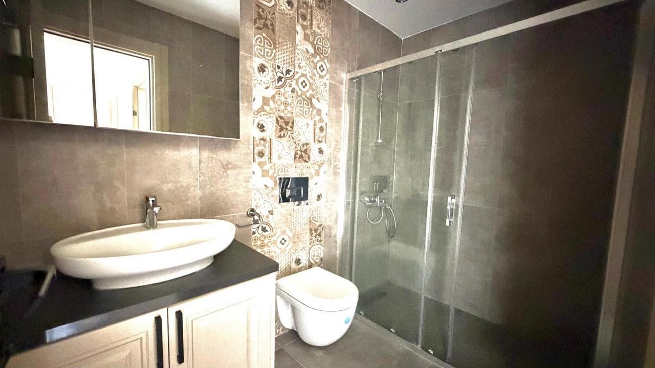 3+1 APARTMENT FOR SALE WITH MOUNTAIN AND POOL VIEWS IN DEĞİRMENDERE, KUŞADASI